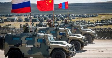 WAR FOOTING – 300,000 Participate in Largest War Games Since Cold War- Russian and Chinese tanks tear up fields and choppers fill the skies. Putin Watches With “Glee” ..USA Media Responds – Demands the Arrest of Russian Social Media Hackers