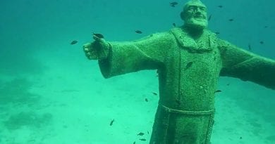 Padre Pio, 40 feet deep, awaits us with open arms